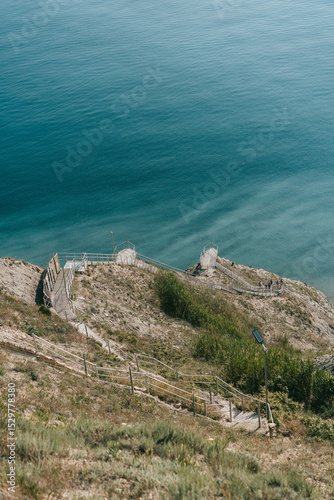  Scenic Wooden Staircase Leading Down to the Sea
