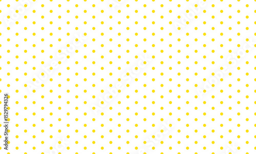 abstract simple yellow polka dot pattern can be used background.