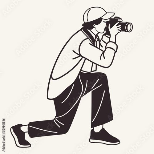 Photographer kneeling taking photo dslr camera casual