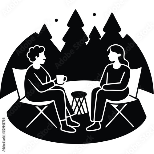 Two people chatting outdoors beside a table with coffee in silhouette in front of trees