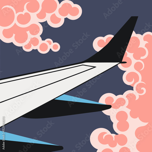 Airplane wing against a backdrop of clouds and dark sky