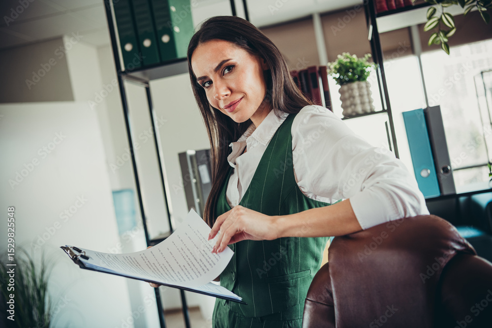 custom made wallpaper toronto digitalConfident businesswoman holding documents in an elegant office setting, embodying professionalism and success