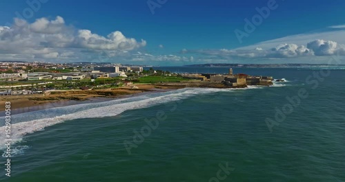 Aerial view of Aljezur Portugal. A small, cozy, traditional surf town at sunset