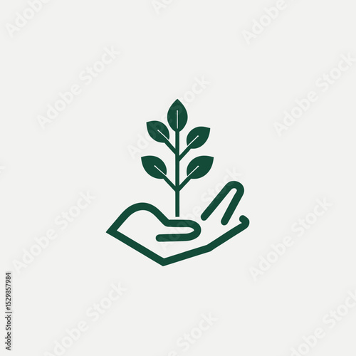 Hand nurturing a small potted plant, symbolizing green growth and new life
