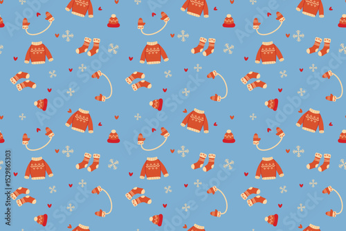 Seamless vector pattern Craft style Christmas elements including snowflakes, sweater, mittens, socks winter hat Cozy hand-drawn design perfect for seasonal wrapping paper fabric  decor Blue background