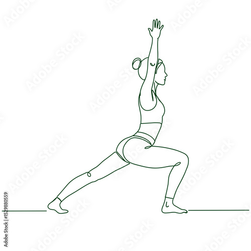 Woman practicing yoga in warrior pose with raised arms  