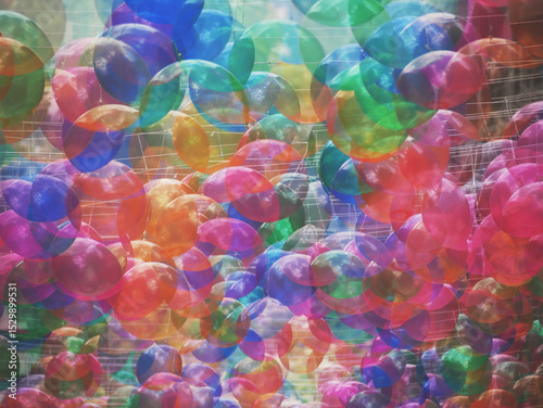 multi exposure of bright colorful balloons creating a psychodelic cloud 