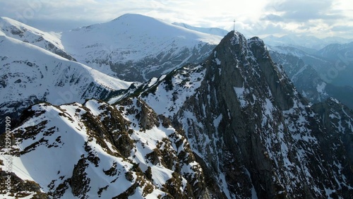 Snow capped mountain peak rocks glacier view from above Zakopane Poland