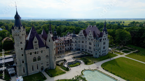Moszna Castle fly over landscape view from above architecture near the village Moszna Poland