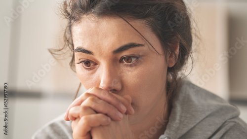 Sad young woman dealing with loss and psychological trauma