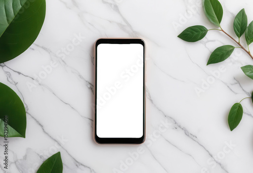 Flat lay of a mobile phone with a blank transparent screen placed on a marble surface alongside green leaves in a bright setting. png