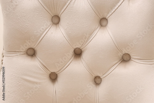 brown textile upholstery on chair