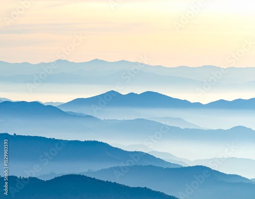 Mountains in the fog at sunset