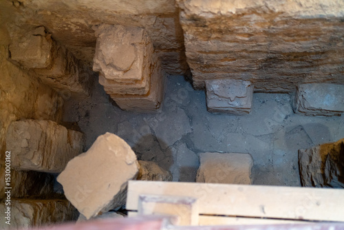 Ancient Stone Carvings: Close-up of weathered stone wall with intricate carvings, whispering stories of a civilization long past.