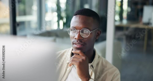 Black man, glasses and reading at computer for business, email networking or review article in office. Creative writer, SEO or thinking with tech for news information, latest trends or proofreading