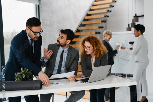 Business team working together on a big project