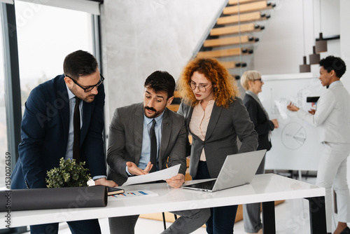 Business team working together on a big project
