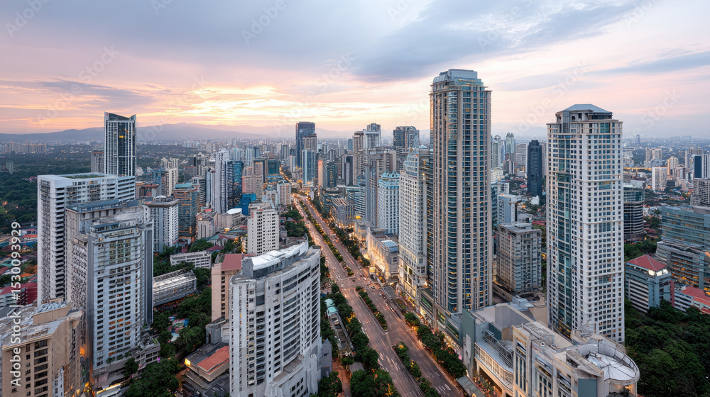 Obraz premium City skyline with tall buildings and sunset sky