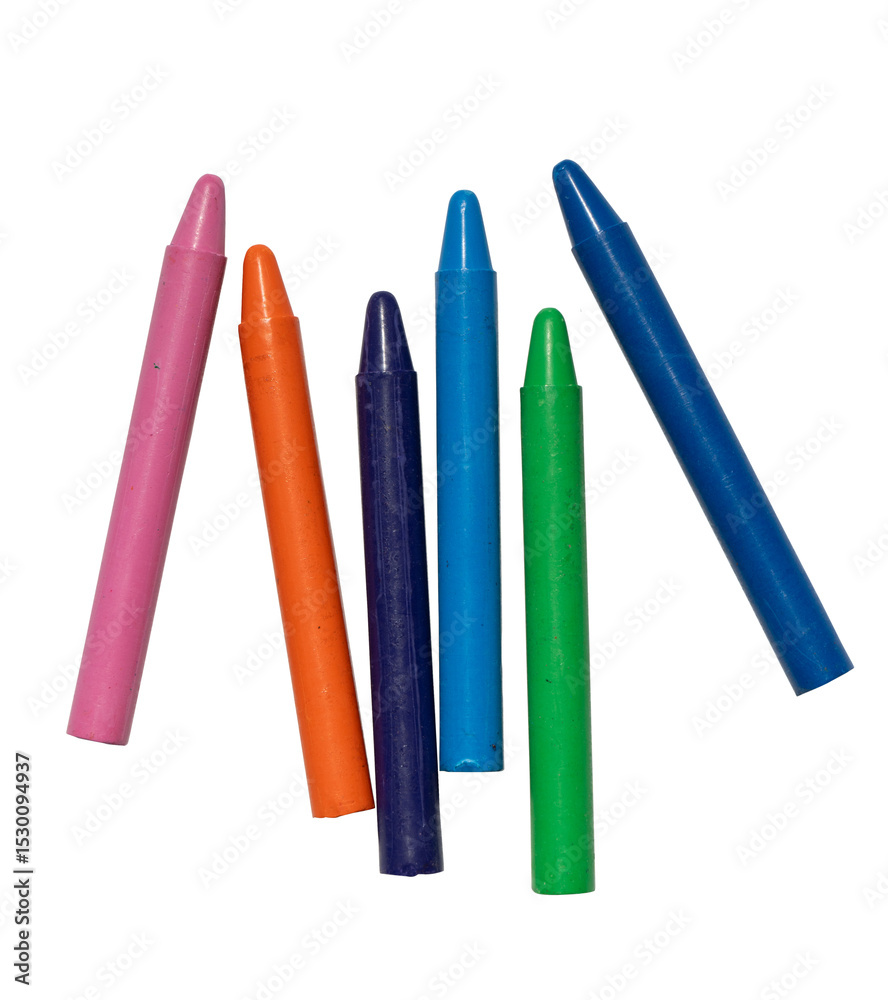 Obraz premium Wax crayons in different bright colors scattered on transparent background representing childhood creativity and artistic tools