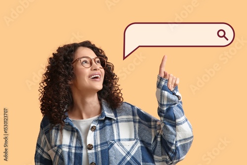 Young woman pointing at web...