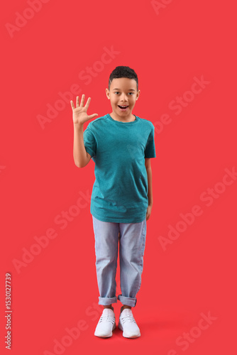 Little African-American boy...