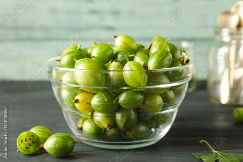 Fresh green gooseberries in...