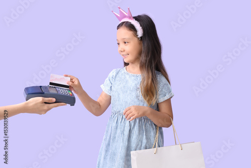 Cute little girl with credi...
