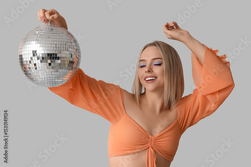 Beautiful young woman with ...