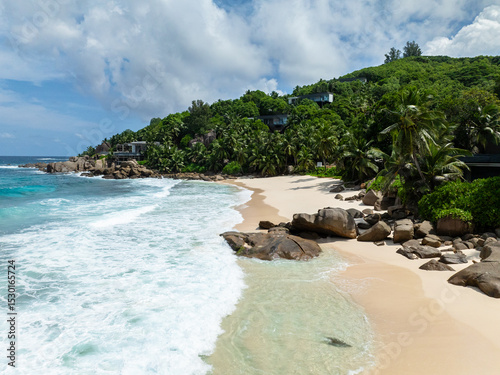 Beach with soft golden sand and azure water. Seychelles, Mahe. Anse Intendance beach.