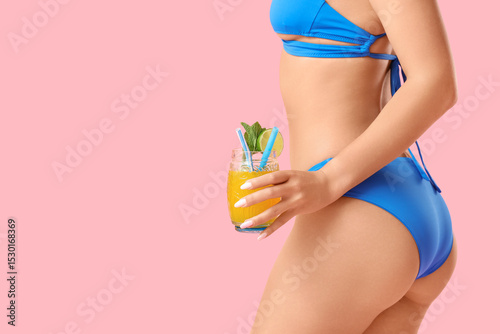 Young Asian woman in swimsu...