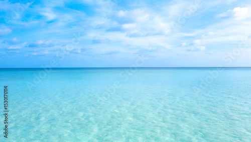 Fototapeta Naklejka Na Ścianę i Meble -  Beautiful Ocean and sea with white cloud on blue sky
