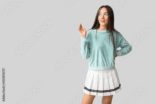 Beautiful young Asian woman...