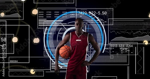 Male basketball player holding ball activating blue HUD with sliding panels for sports analytics