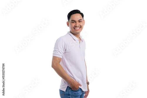 Smiling young Asian man in casual outfit standing with hand in pocket looking at camera isolated on transparent background