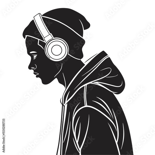 Silhouette of a young man wearing a beanie and headphones listening to music