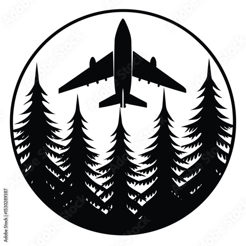 Low flying airplane silhouette over forest
