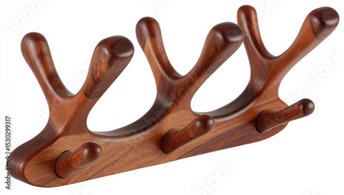 Wooden coat rack with stylized, organic forms photo