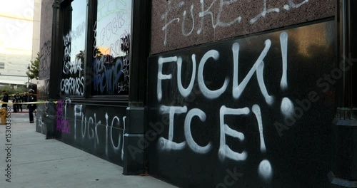 Los Angeles, California, USA - June 10, 2025: Downtown buildings are covered in protest graffiti in response to ICE deportation raids.