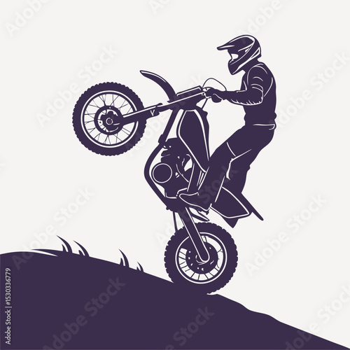Extreme Motocross Rider Performing a Wheelie Stunt on a Dirt Bike
