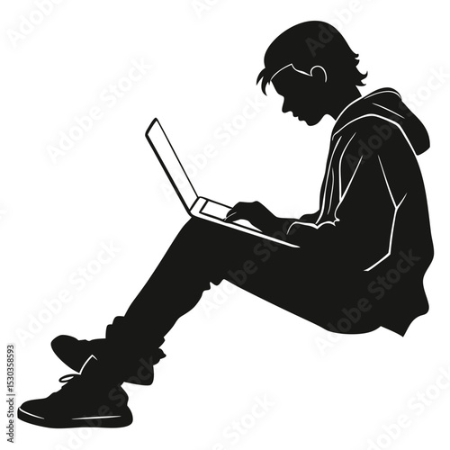 Silhouette of a Focused Young Person Using a Laptop Computer on the Ground