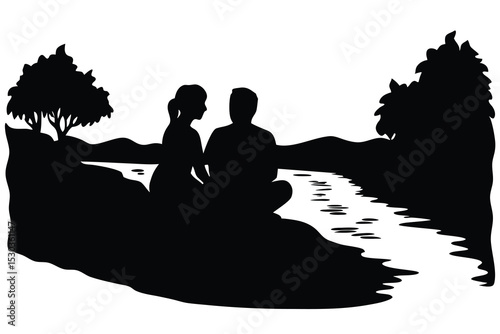 Romantic couple silhouette by river at sunset