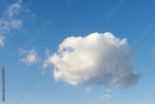 Fluffy white cloud on blue sky background, copy space