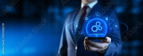 Businessman Holding smartphone with Automation Process Icons on Screen. Business and Industry concept