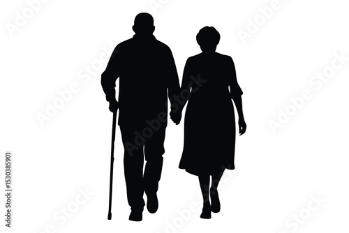 Silhouette of elderly couple walking hand in hand