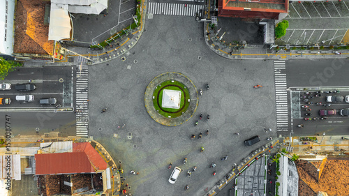 Konstfotografi Aerial View of a City Intersection with Central Roundabout and Surrounding Build