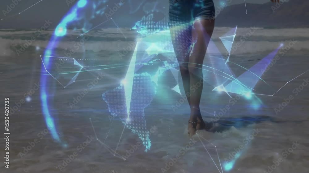Woman stepping into surf activating glowing triangle mesh forming rotating wireframe sphere in tech