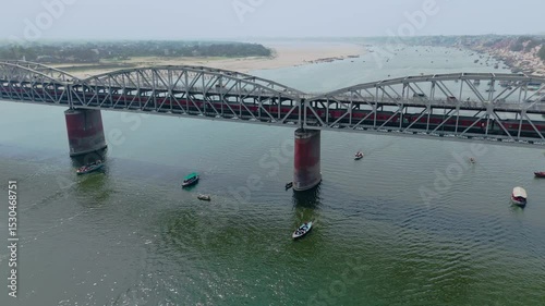 Varanasi, Uttar Pradesh, India-25th February 2025- Aerial view drone shot of Malvia bridge in Varanasi city, a double decker bridge for Railway as well as vehicles constructed over Ganga River.
