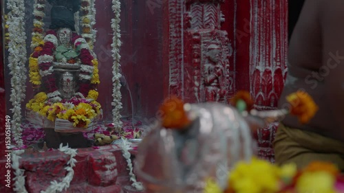 Varanasi, Uttar Pradesh, India-24th February 2025- Close high speed shot of a shiv ling in shiva temple of Varanasi in Uttar Pradesh.