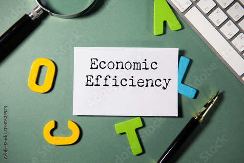 economic efficiency text on notepad