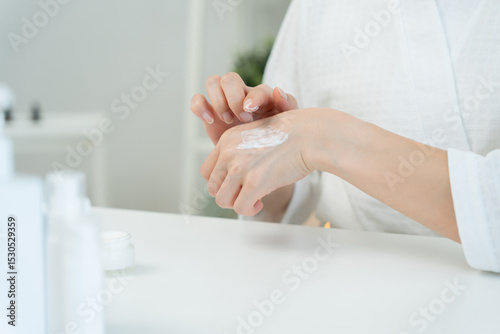 Wallpaper Mural Beautiful Asian woman smile use cream for good skin. healthy woman apply cream for body. Advertisement for skin cream, anti-wrinkle, baby face, whitening, moisturizer, tighten pores serum Torontodigital.ca